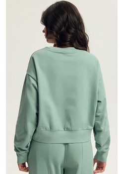 Esotiq bluza damska Bloovii Keithan 43785-07X, Kolor matcha, Rozmiar M, BLOOVII ze sklepu Primodo w kategorii Bluzy damskie - zdjęcie 187056748