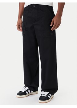 adidas Spodnie materiałowe Premium Essentials JY2636 Czarny Loose Fit ze sklepu MODIVO w kategorii Spodnie męskie - zdjęcie 187233256