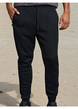 Sinsay - Spodnie jogger - czarny - id: 025EV-99X - marki Sinsay - 187241465 Sinsay - Spodnie jogger - czarny ze sklepu Sinsay w kategorii Spodnie męskie - zdjęcie 187241465