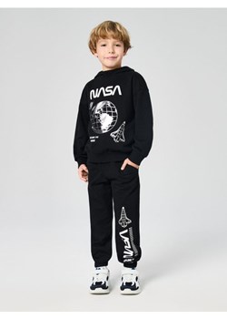 Sinsay - Spodnie dresowe jogger NASA - czarny ze sklepu Sinsay w kategorii Spodnie chłopięce - zdjęcie 187266435