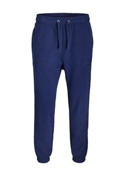 Jack & Jones Spodnie dresowe Kane Bleecker 12287165 Niebieski Relaxed Fit ze sklepu MODIVO w kategorii Spodnie męskie - zdjęcie 187285445