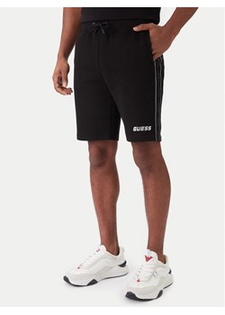 Guess Szorty materiałowe Mickey Z4RD04 KB3P2 Czarny Regular Fit - id: 0000303520540 - marki Guess - 187285559 Guess Szorty materiałowe Mickey Z4RD04 KB3P2 Czarny Regular Fit ze sklepu MODIVO w kategorii Spodenki męskie - zdjęcie 187285559