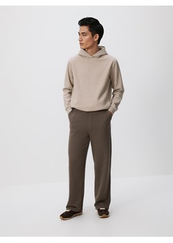 Reserved - Spodnie dresowe z bawełną - brązowy ze sklepu Reserved w kategorii Spodnie męskie - zdjęcie 187290456