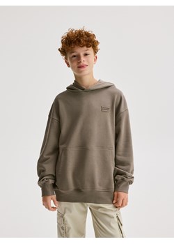 Reserved - Bluza oversize z kapturem - ciemnobrązowy - id: 914FJ-89X - marki Reserved - 187291055 Reserved - Bluza oversize z kapturem - ciemnobrązowy ze sklepu Reserved w kategorii Bluzy chłopięce - zdjęcie 187291055