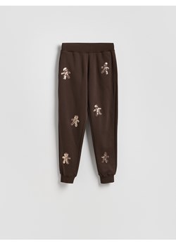 Reserved - Spodnie dresowe z aplikacjami - ciemnobrązowy - id: 626GA-89X - marki Reserved - 187298038 Reserved - Spodnie dresowe z aplikacjami - ciemnobrązowy ze sklepu Reserved w kategorii Spodnie damskie - zdjęcie 187298038