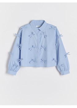 Reserved - Koszula z kokardkami - jasnoniebieski - id: 208BG-50X - marki Reserved - 187318249 Reserved - Koszula z kokardkami - jasnoniebieski ze sklepu Reserved w kategorii Koszule dziewczęce - zdjęcie 187318249