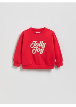Reserved - Bluza ze świątecznym napisem - czerwony ze sklepu Reserved w kategorii Bluzy dziewczęce - zdjęcie 187331739