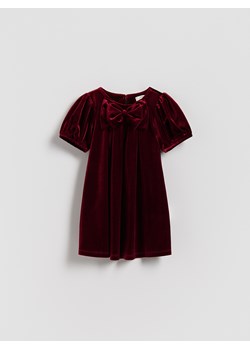 Reserved - Welurowa sukienka z kokardą - czerwony ze sklepu Reserved w kategorii Sukienki dziewczęce - zdjęcie 187347699
