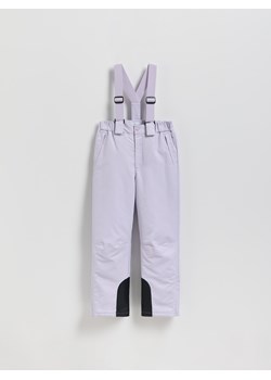 Reserved - Ocieplane spodnie na szelkach - lawendowy ze sklepu Reserved w kategorii Spodnie dziewczęce - zdjęcie 187363527