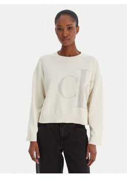 Calvin Klein Jeans Sweter Smooth LV047E304G Beżowy Regular Fit ze sklepu MODIVO w kategorii Swetry damskie - zdjęcie 187391215