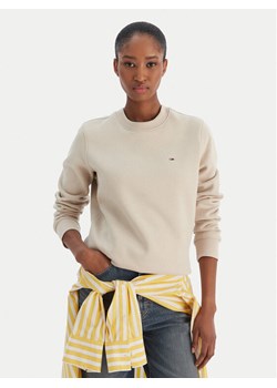Tommy Jeans Bluza Flag DW0DW19959 Beżowy Regular Fit ze sklepu MODIVO w kategorii Bluzy damskie - zdjęcie 187393059
