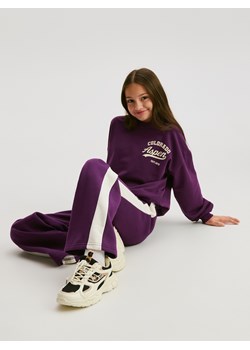 Reserved - Spodnie dresowe z lampasami - ciemnofioletowy ze sklepu Reserved w kategorii Spodnie dziewczęce - zdjęcie 187394678
