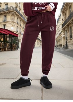 Sinsay - Spodnie jogger w stylu akademickim - bordowy ze sklepu Sinsay w kategorii Spodnie damskie - zdjęcie 187479299