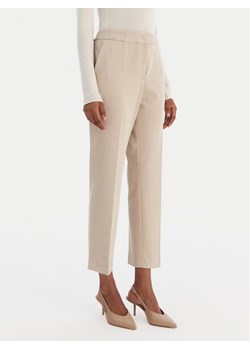 BOSS Spodnie materiałowe Tapria 50555740 Beżowy Slim Fit ze sklepu MODIVO w kategorii Spodnie damskie - zdjęcie 187481235
