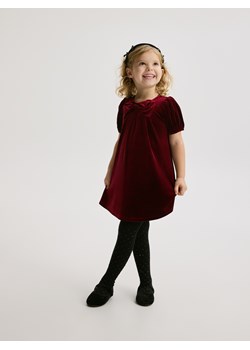 Reserved - Welurowa sukienka z kokardą - czerwony ze sklepu Reserved w kategorii Sukienki dziewczęce - zdjęcie 187509019