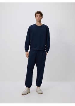 Reserved - Spodnie dresowe comfort fit - granatowy ze sklepu Reserved w kategorii Spodnie męskie - zdjęcie 187511149