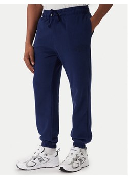 Jack & Jones Spodnie dresowe Kane Bleecker 12287165 Niebieski Relaxed Fit ze sklepu MODIVO w kategorii Spodnie męskie - zdjęcie 187516439