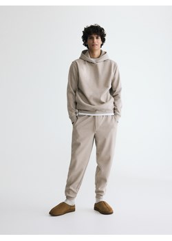 Reserved - Spodnie dresowe regular fit - beżowy ze sklepu Reserved w kategorii Spodnie męskie - zdjęcie 187525937