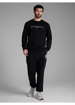 Męskie spodnie dresowe joggery 4F 4FRAW25TTROM1694 - czarne ze sklepu Sportstylestory.com w kategorii Spodnie męskie - zdjęcie 187528695