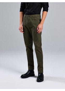 Sinsay - Spodnie jeansowe slim - zielony ze sklepu Sinsay w kategorii Jeansy męskie - zdjęcie 187535909