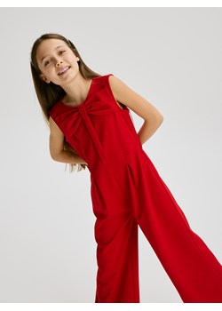 Reserved - Kombinezon z kokardą - czerwony ze sklepu Reserved w kategorii Kombinezony dziewczęce - zdjęcie 187545797