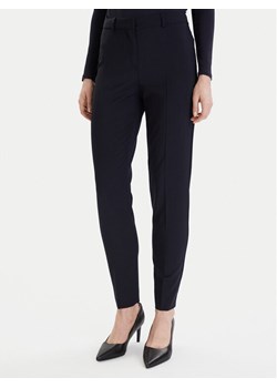 Boss Spodnie materiałowe 50490051 Granatowy Regular Fit ze sklepu MODIVO w kategorii Spodnie damskie - zdjęcie 187553819