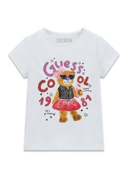 Guess Kids Top 180204 Biały Classic Fit ze sklepu MODIVO w kategorii Bluzki dziewczęce - zdjęcie 187556898