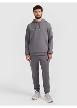 Męskie spodnie dresowe joggery 4F 4FRAW25TTROM1610 - szare ze sklepu Sportstylestory.com w kategorii Spodnie męskie - zdjęcie 187558118