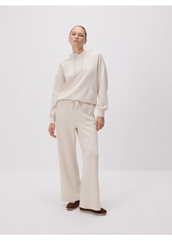 Reserved - Spodnie z szeroką nogawką - beżowy ze sklepu Reserved w kategorii Spodnie damskie - zdjęcie 187574866