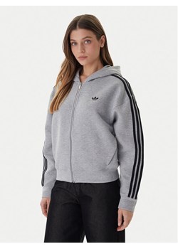 adidas Bluza adicolor 3-Stripes JY2620 Szary Regular Fit ze sklepu MODIVO w kategorii Bluzy damskie - zdjęcie 187582158