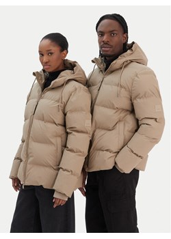 Rains Kurtka zimowa Unisex 15120 Beżowy Regular Fit ze sklepu MODIVO w kategorii Kurtki damskie - zdjęcie 187583819