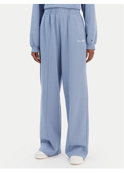 Tommy Hilfiger Spodnie dresowe Script WW0WW48784 Niebieski Relaxed Fit ze sklepu MODIVO w kategorii Spodnie damskie - zdjęcie 187585338