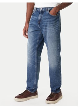 Tommy Hilfiger Jeansy Harlem MW0MW41890 Niebieski Tapered Fit ze sklepu MODIVO w kategorii Jeansy męskie - zdjęcie 187585438