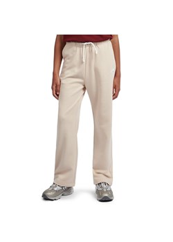 Spodnie dziecięce New Balance LAKG0216BIS - beżowe ze sklepu streetstyle24.pl w kategorii Spodnie dziewczęce - zdjęcie 187587416