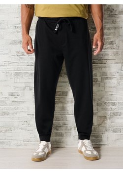 Sinsay - Spodnie dresowe jogger - czarny ze sklepu Sinsay w kategorii Spodnie męskie - zdjęcie 187597377