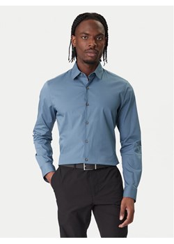 Calvin Klein Koszula Essentials LV019EU037 Niebieski Slim Fit ze sklepu MODIVO w kategorii Koszule męskie - zdjęcie 187598438
