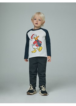 Reserved - Longsleeve Kaczor Donald - złamana biel ze sklepu Reserved w kategorii T-shirty chłopięce - zdjęcie 187604507