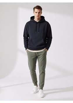 Sinsay - Spodnie dresowe jogger - zielony ze sklepu Sinsay w kategorii Spodnie męskie - zdjęcie 187615315