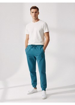 Sinsay - Spodnie jogger - niebieski ze sklepu Sinsay w kategorii Spodnie męskie - zdjęcie 187615325