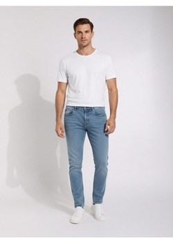 Sinsay - Jeansy chino slim fit - niebieski ze sklepu Sinsay w kategorii Jeansy męskie - zdjęcie 187615408