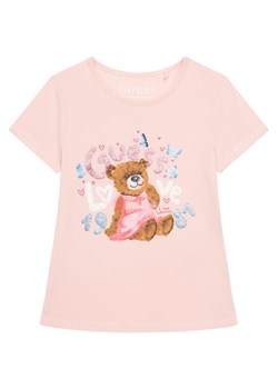 Guess T-Shirt K6RI03 K6YW4 Różowy Regular Fit ze sklepu MODIVO w kategorii Bluzki dziewczęce - zdjęcie 187623657