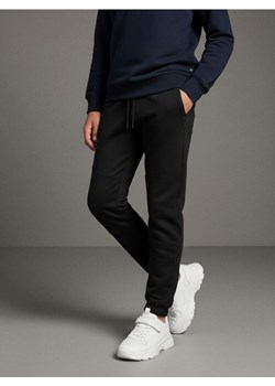 Sinsay - Spodnie dresowe jogger - czarny ze sklepu Sinsay w kategorii Spodnie chłopięce - zdjęcie 187636819