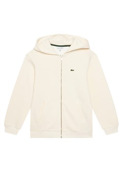 Lacoste Bluza SJ9723 Écru Regular Fit ze sklepu MODIVO w kategorii Bluzy chłopięce - zdjęcie 187641738