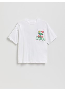 Reserved - Świąteczny t-shirt Grinch - biały ze sklepu Reserved w kategorii Bluzki dziewczęce - zdjęcie 187647276