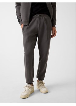 Guess Spodnie dresowe Z2YB09 KB3P2 Szary Regular Fit ze sklepu MODIVO w kategorii Spodnie męskie - zdjęcie 187670205