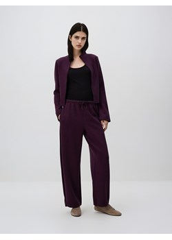 Reserved - Spodnie z dodatkiem wiskozy - ciemnofioletowy ze sklepu Reserved w kategorii Spodnie damskie - zdjęcie 187673779