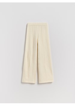 Reserved - Dzianinowe spodnie z domieszką wełny - złamana biel ze sklepu Reserved w kategorii Spodnie dziewczęce - zdjęcie 187695526