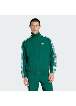 adidas Bluza Firebird KC8018 Zielony Regular Fit ze sklepu MODIVO w kategorii Bluzy męskie - zdjęcie 187696238