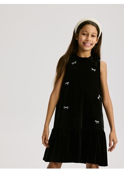 Reserved - Welurowa sukienka w kokardki - czarny ze sklepu Reserved w kategorii Sukienki dziewczęce - zdjęcie 187766885
