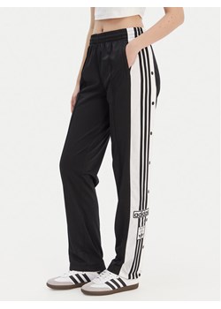 adidas Spodnie dresowe Adibreak KD2932 Czarny Loose Fit ze sklepu MODIVO w kategorii Spodnie damskie - zdjęcie 187781145